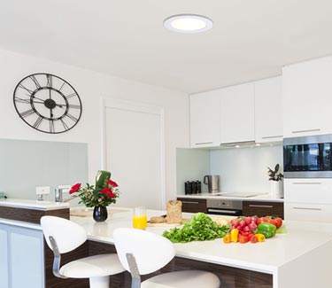 Natural Light residential tubular skylight installed in modern kitchen thumb